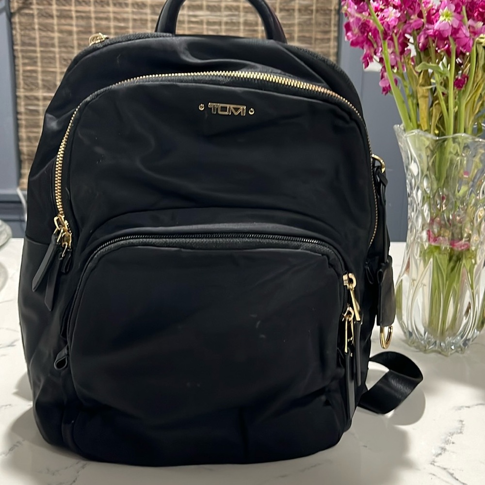 Black nylon Tumi backbag